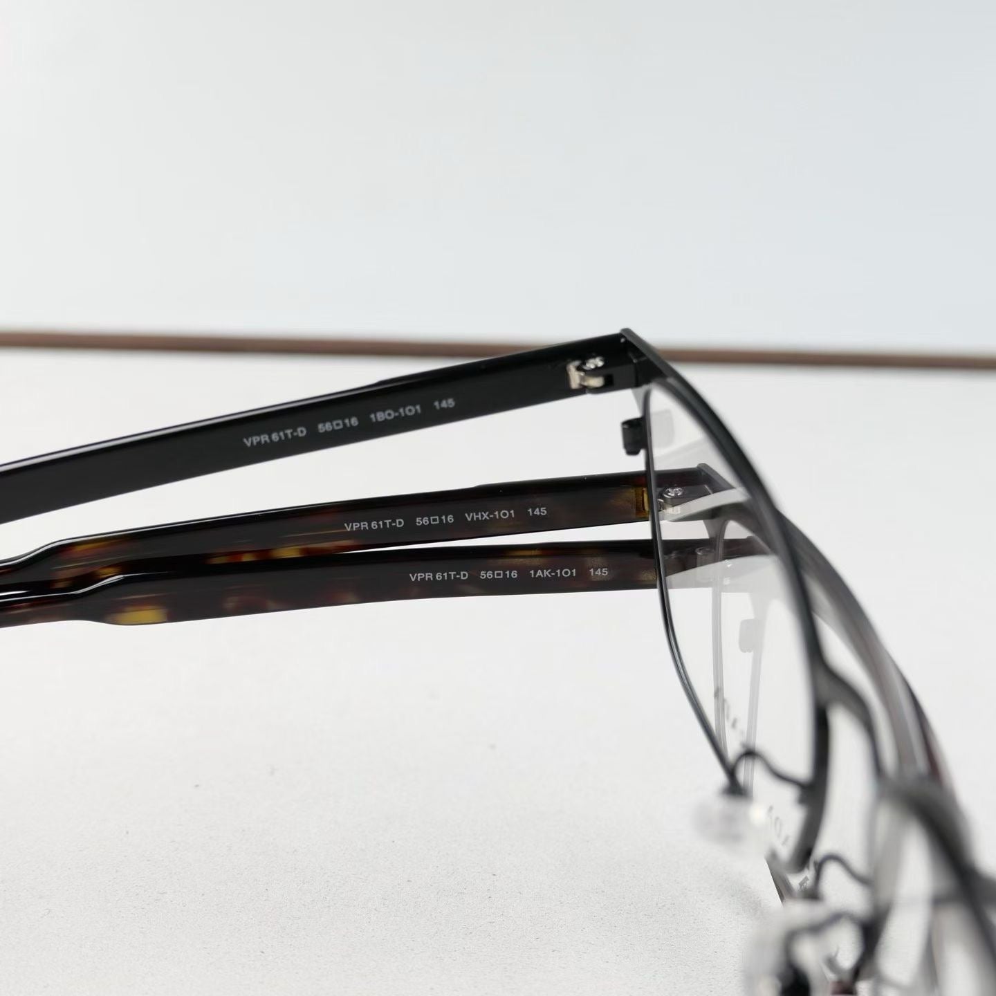 Inspired PRADA VPR61T-D – Titanium Rectangular Eyeglasses (1:1 Mirror Quality)