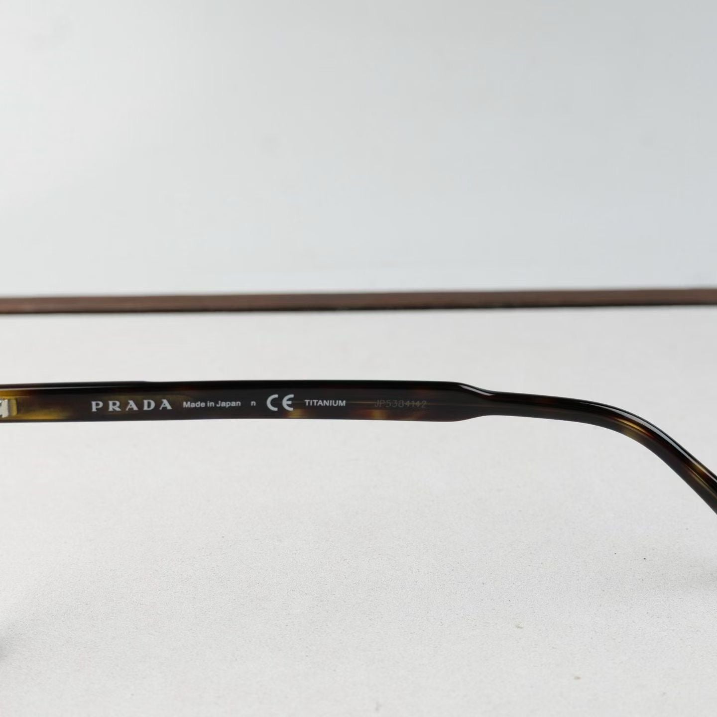 Inspired PRADA VPR61T-D – Titanium Rectangular Eyeglasses (1:1 Mirror Quality)